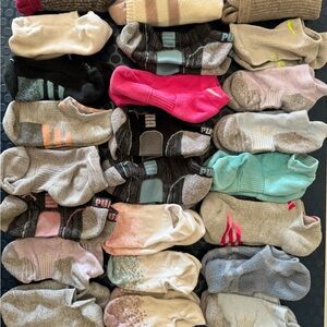 Women’s Socks! 24 pairs of assorted brands. Nike Adidas, Puma and others.